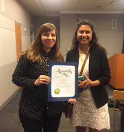 Life on the Line Co-Director Jen Gilomen pictured with certificate and staff member from California Assemblymember Ash Kalra